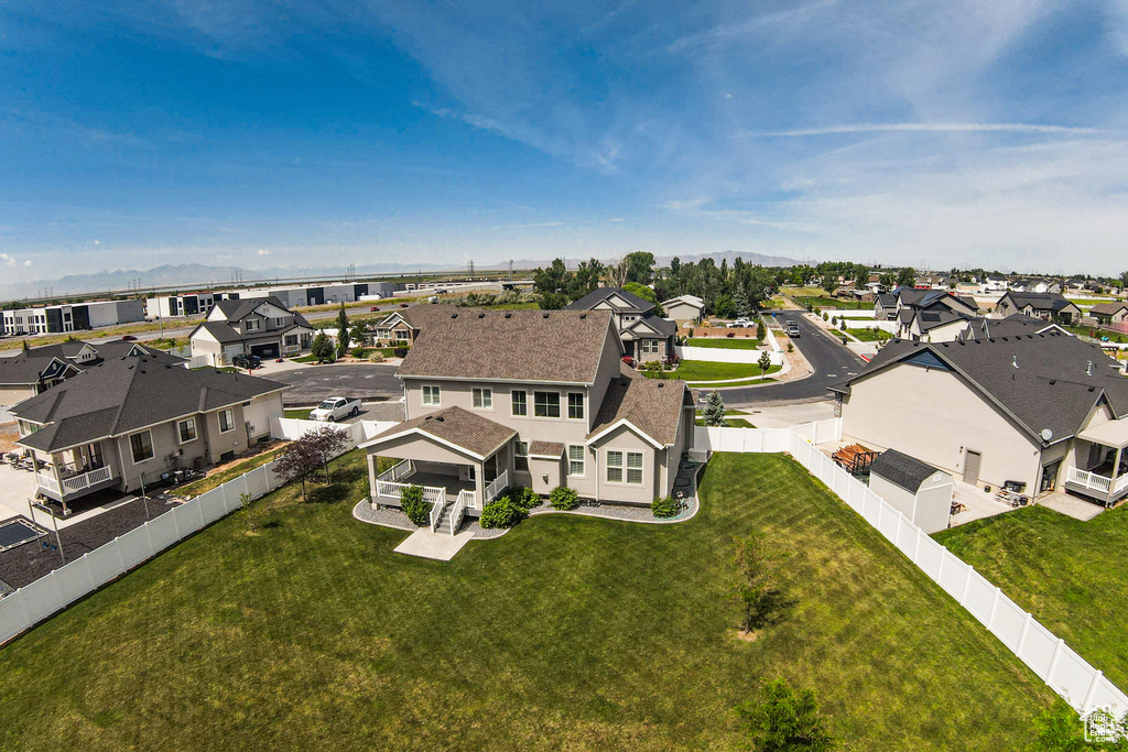 Aerial view of residential area with a mountain backdrop