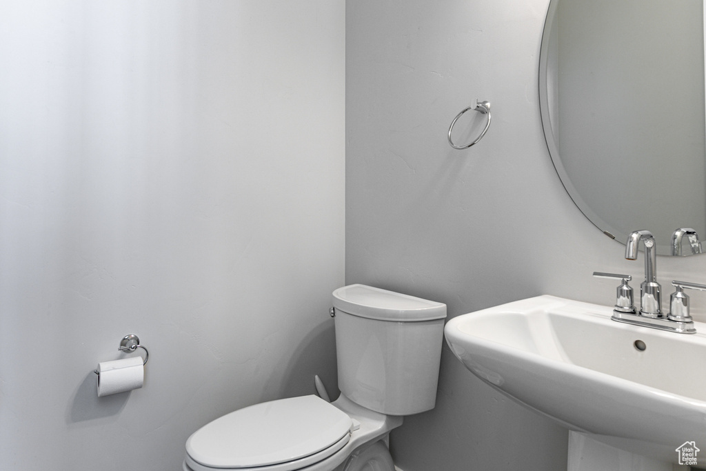 Bathroom with a sink and toilet