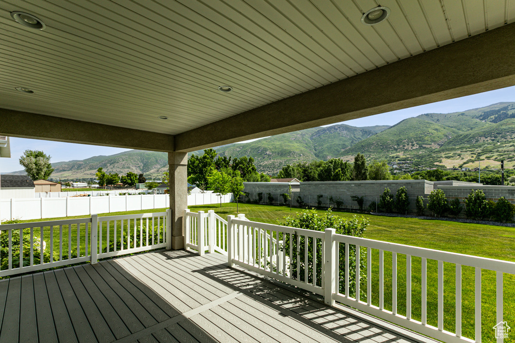 Wooden deck featuring a mountain view