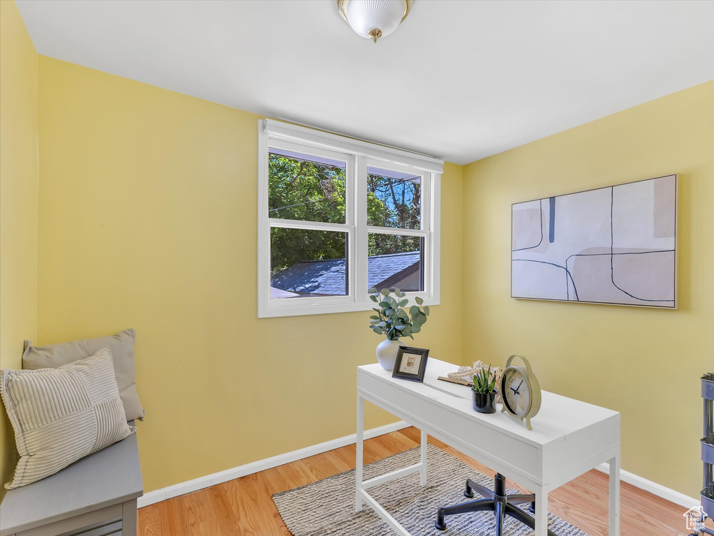 Office featuring baseboards and light wood-style floors