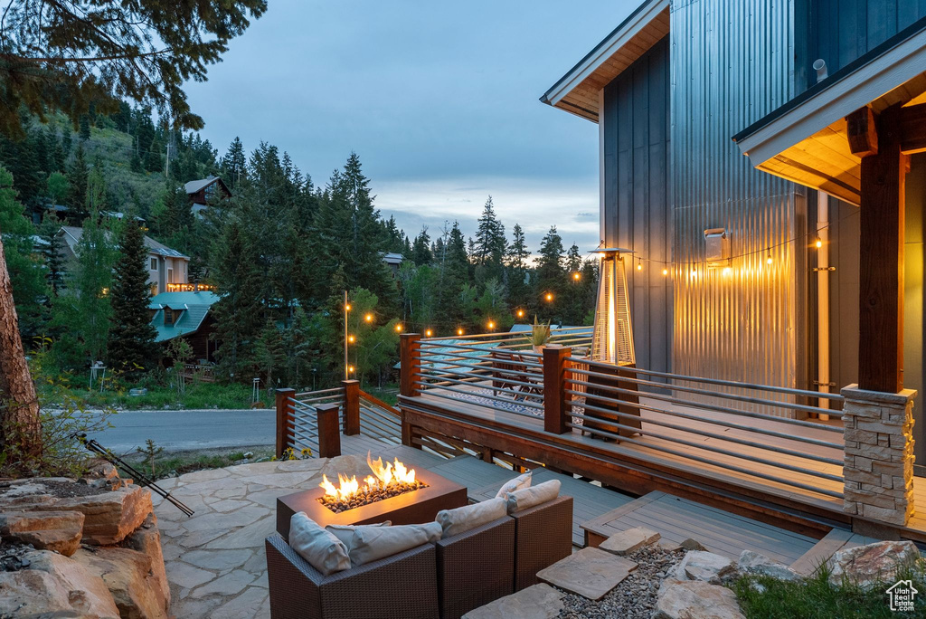 View of patio / terrace featuring an outdoor living space with a fire pit