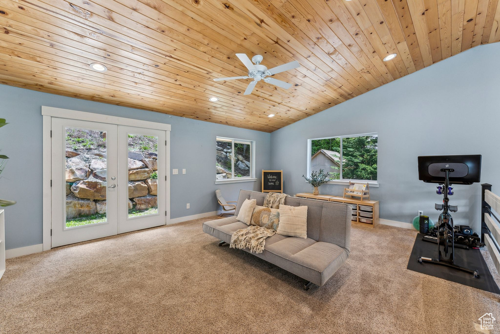 Living area with carpet, french doors, recessed lighting, wood ceiling, and vaulted ceiling