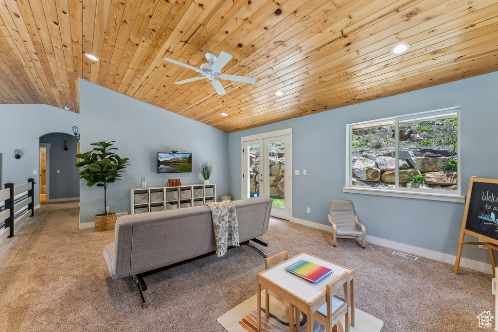 Living area featuring carpet floors, wooden ceiling, recessed lighting, ceiling fan, and lofted ceiling
