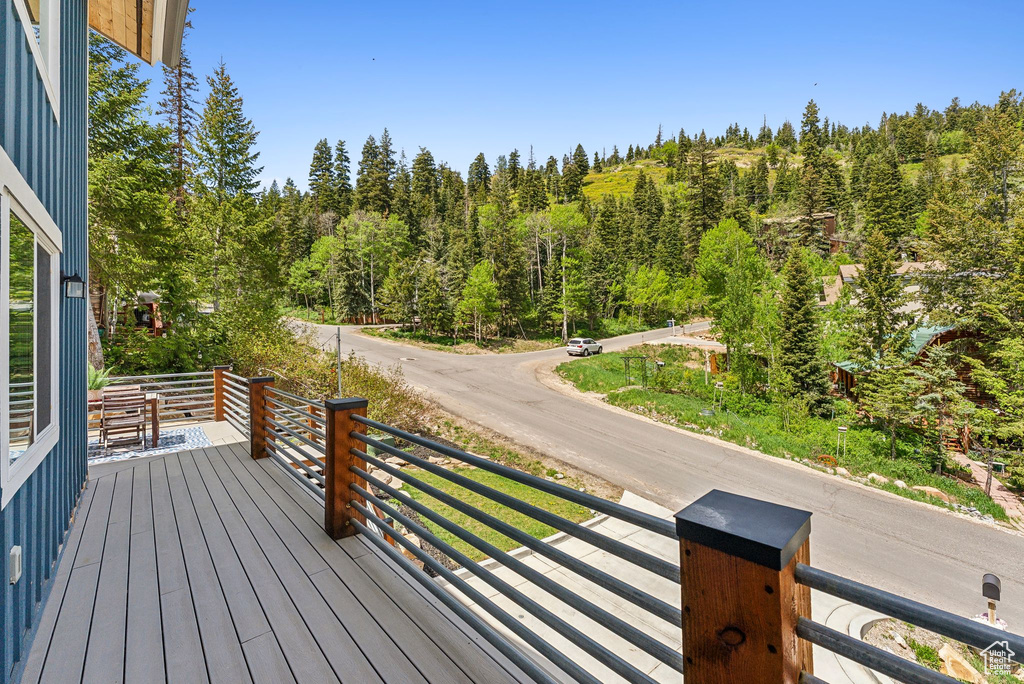 Deck featuring a view of trees
