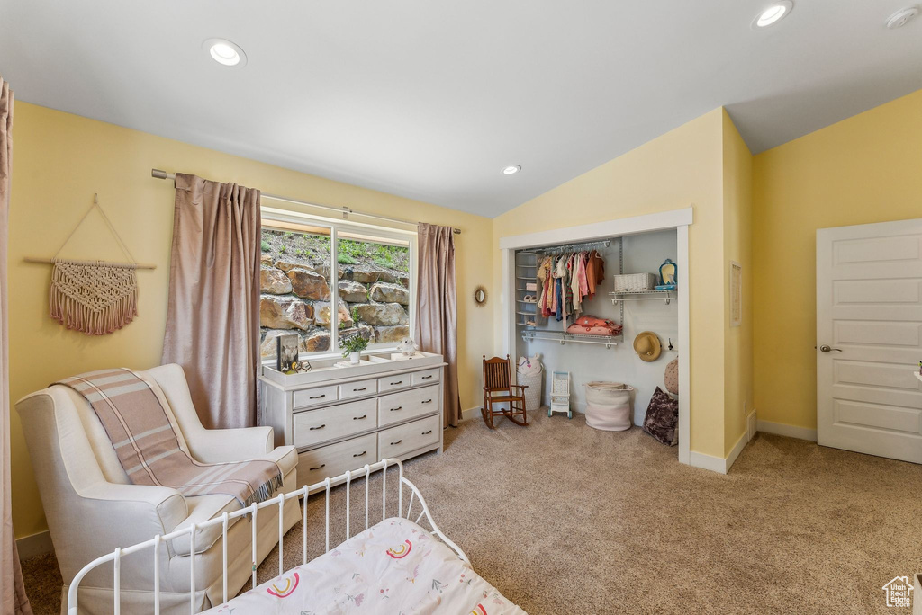 Sitting room with vaulted ceiling, carpet, recessed lighting, and baseboards