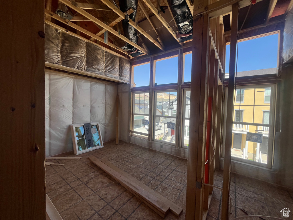 Unfurnished sunroom with plenty of natural light