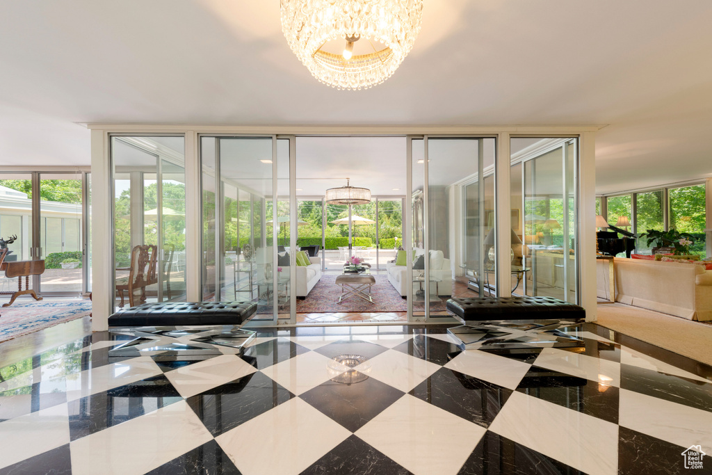 Common area featuring floor to ceiling windows