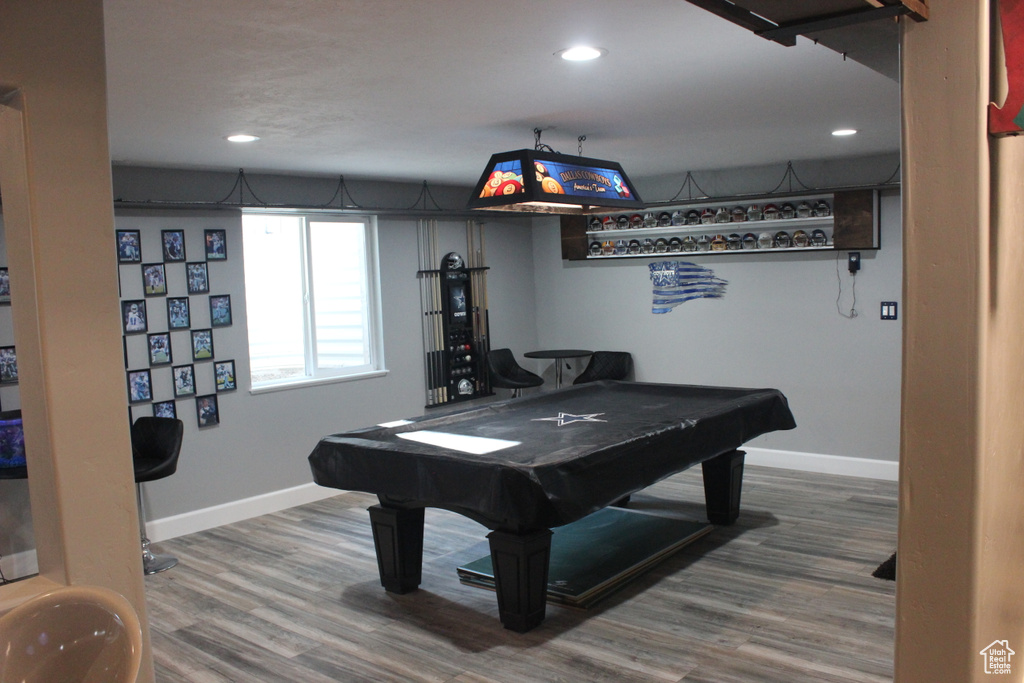 Recreation room featuring baseboards, wood finished floors, recessed lighting, and billiards
