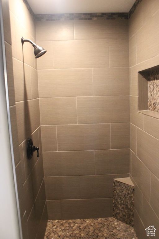 Bathroom with a tile shower