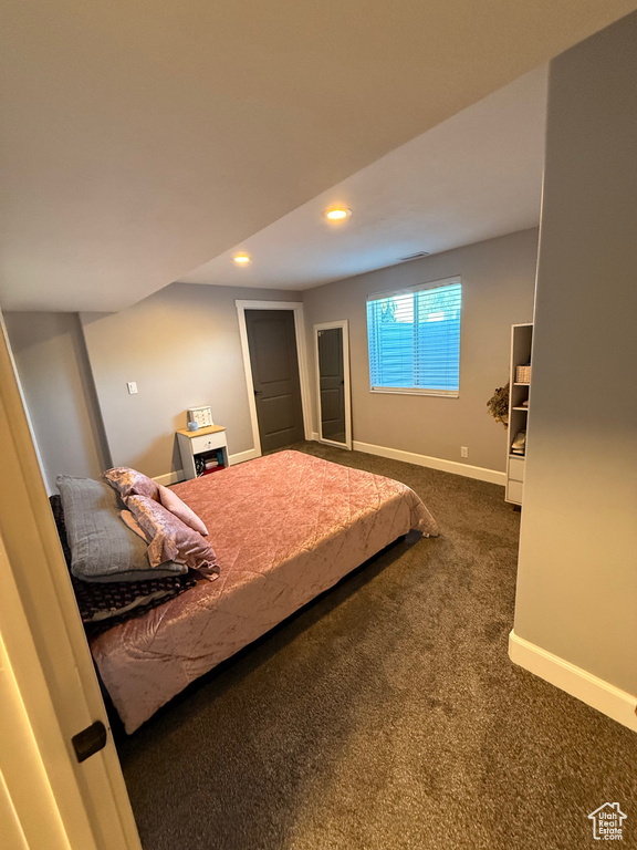 Bedroom with carpet, baseboards, and recessed lighting