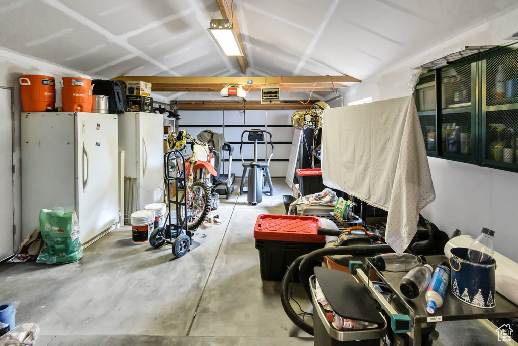Garage with freestanding refrigerator
