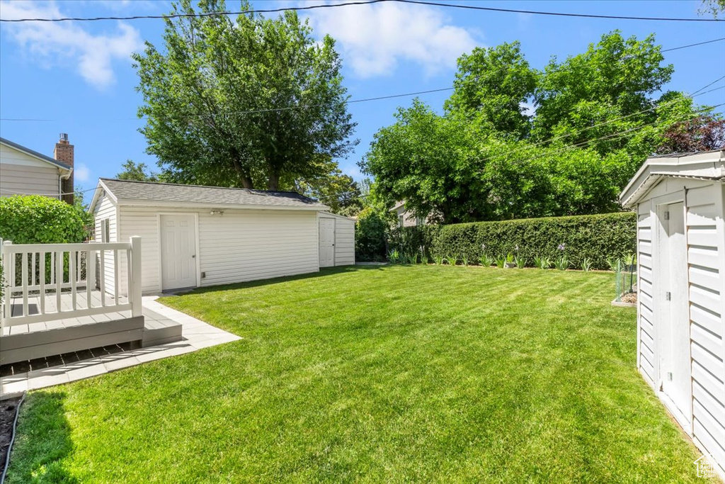 View of yard featuring a deck