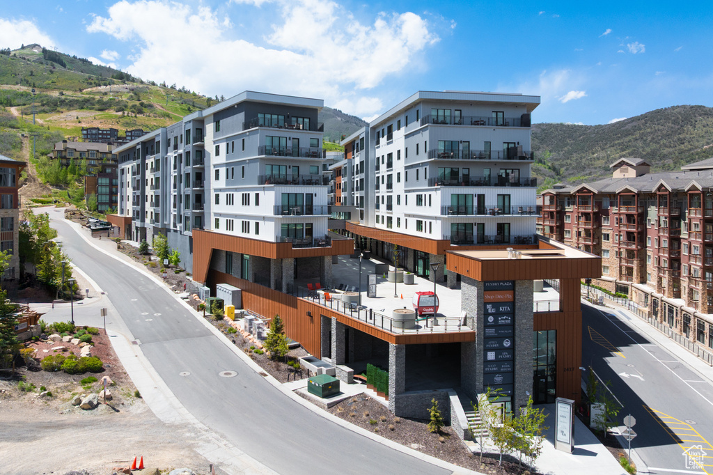 View of apartment building / complex with a mountain view
