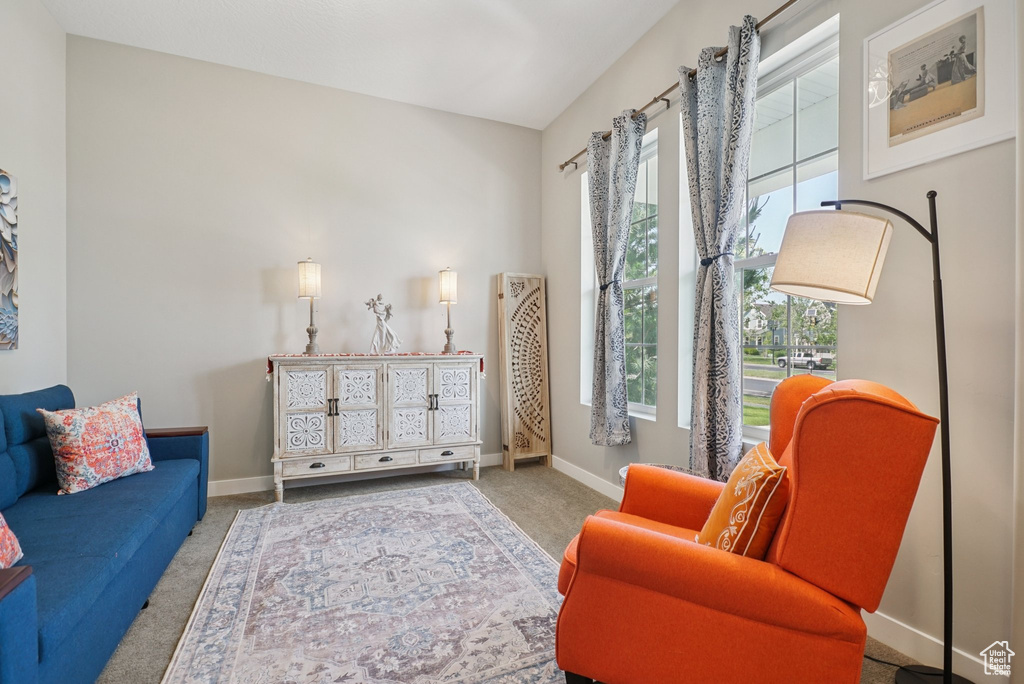 Sitting room with carpet flooring and baseboards
