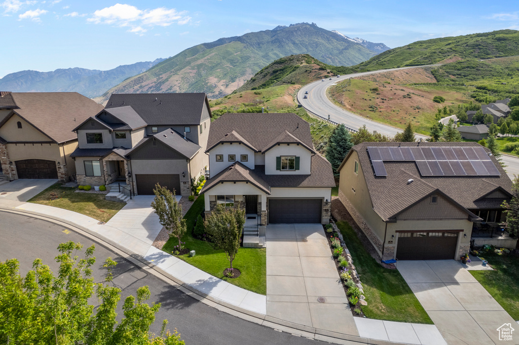 Aerial view of residential area with a mountain backdrop