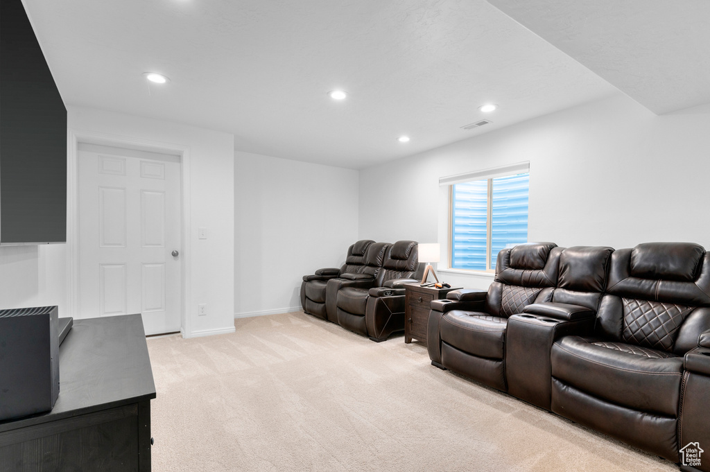 Cinema featuring recessed lighting, light colored carpet, and baseboards
