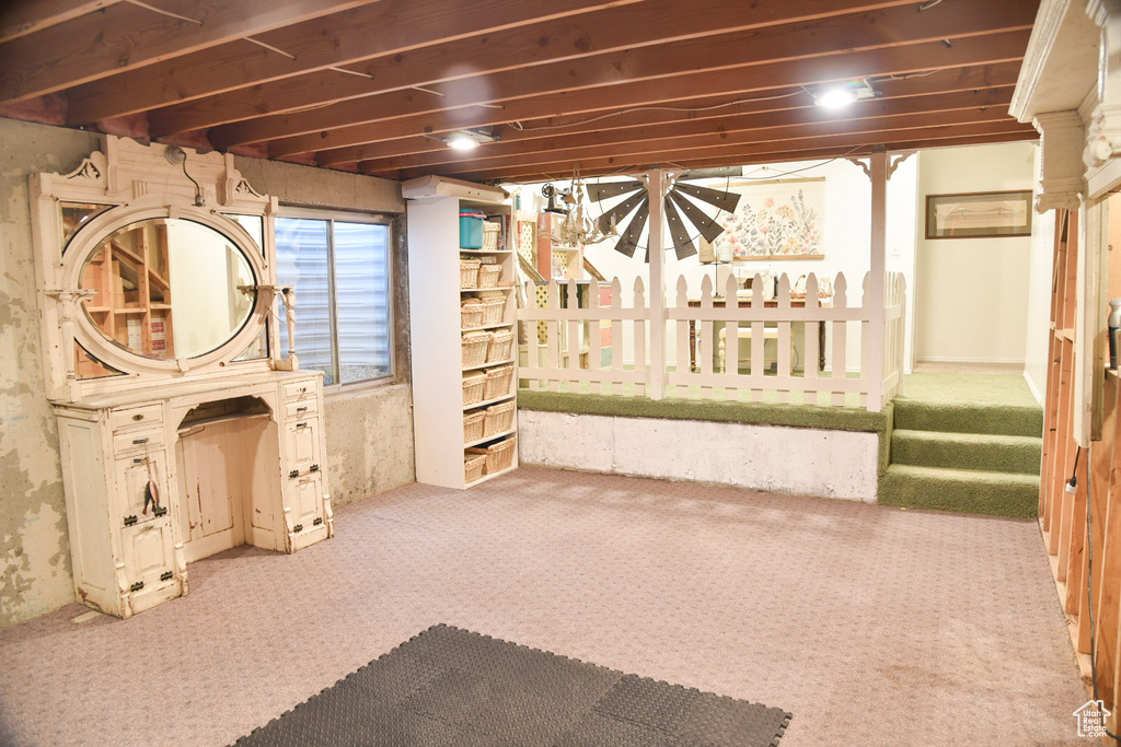 Basement with carpet