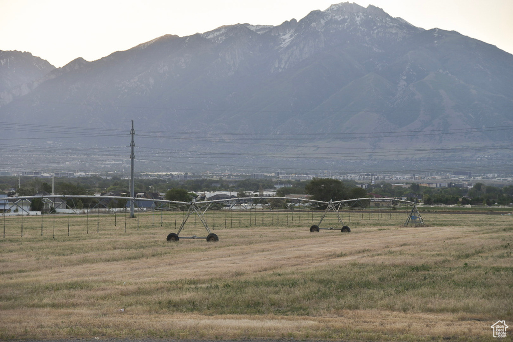 View of mountain backdrop featuring rural landscape