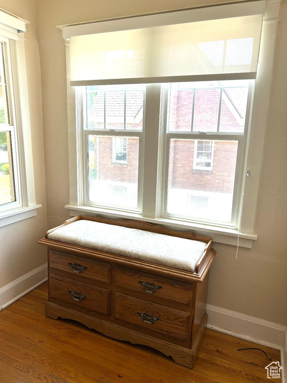 Detailed view of wood finished floors and baseboards