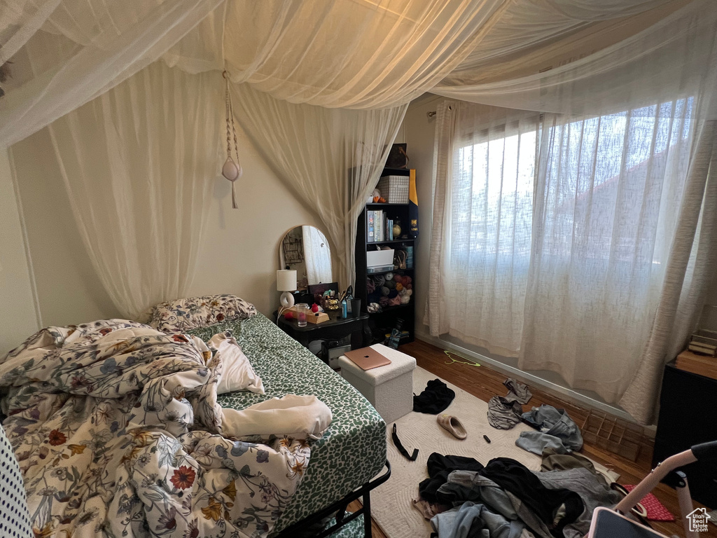 Bedroom featuring wood finished floors
