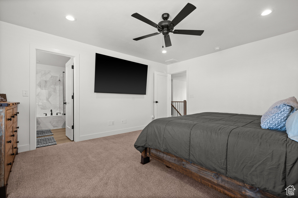 Bedroom with carpet, recessed lighting, baseboards, ensuite bath, and ceiling fan