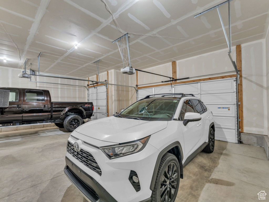 Parking garage featuring a garage door opener