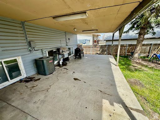 View of patio / terrace featuring central air condition unit