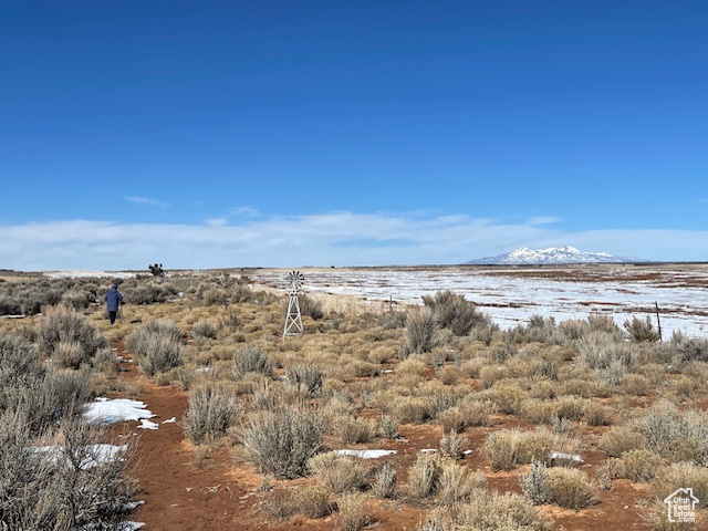 View of undeveloped land featuring a mountainous background