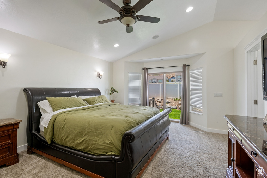 Bedroom with access to outside, lofted ceiling, light colored carpet, recessed lighting, and ceiling fan