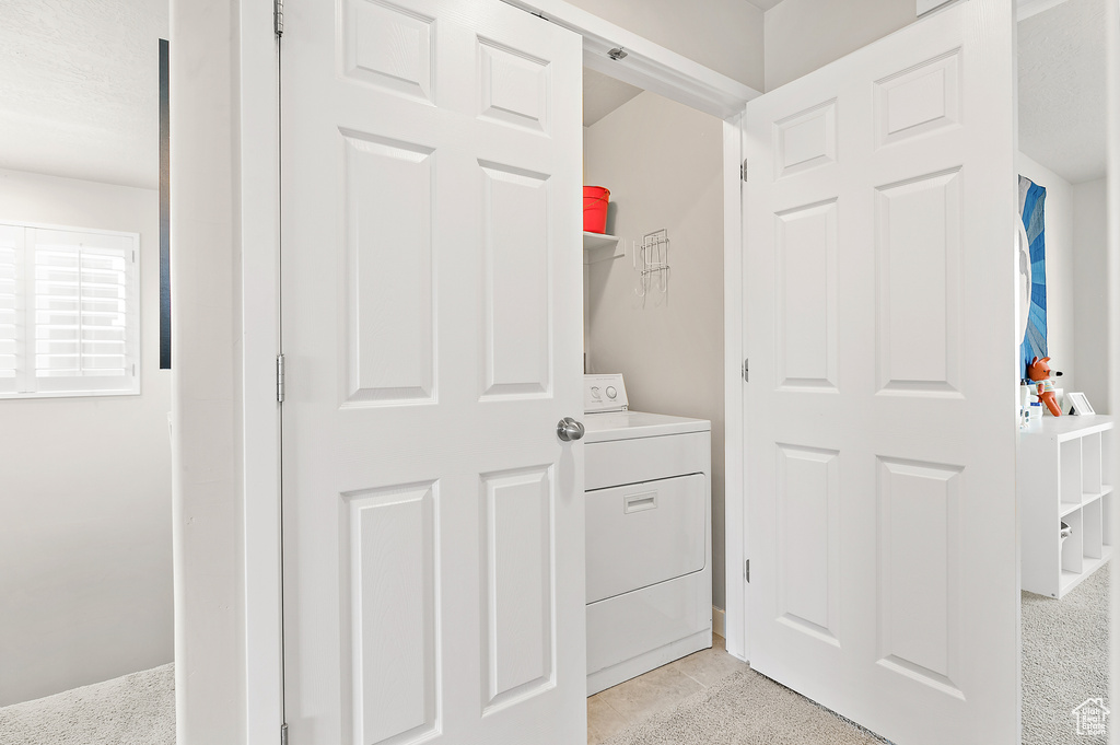 Laundry room featuring washer / clothes dryer