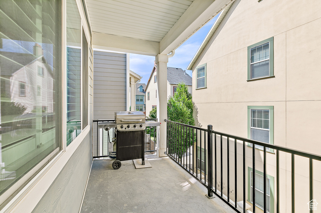 Balcony featuring area for grilling