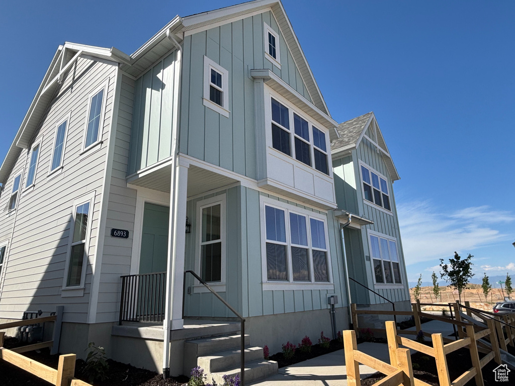 View of front of home with board and batten siding