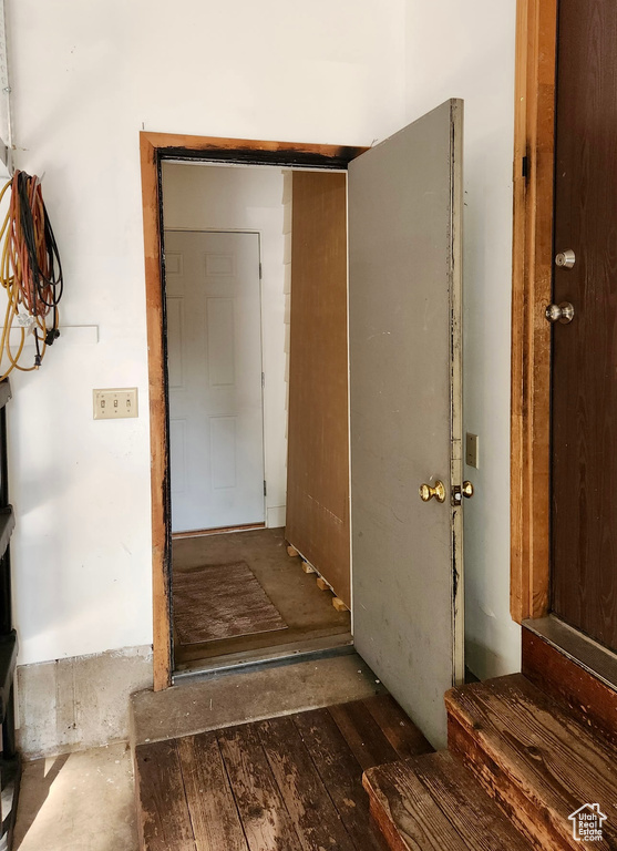 Hallway featuring wood-type flooring