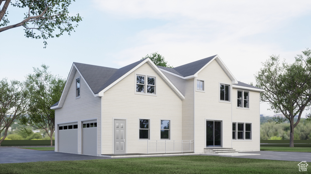 View of front facade with asphalt driveway, a garage, and a front yard