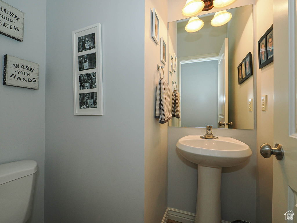 Half bathroom featuring toilet