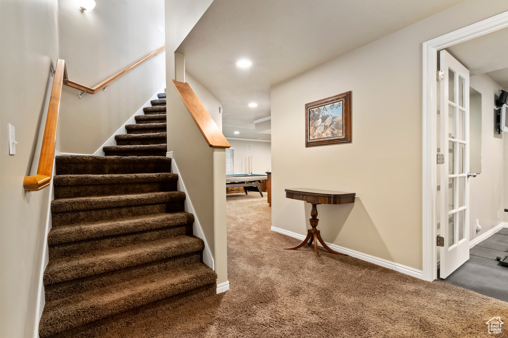 Staircase with carpet, recessed lighting, baseboards, and pool table