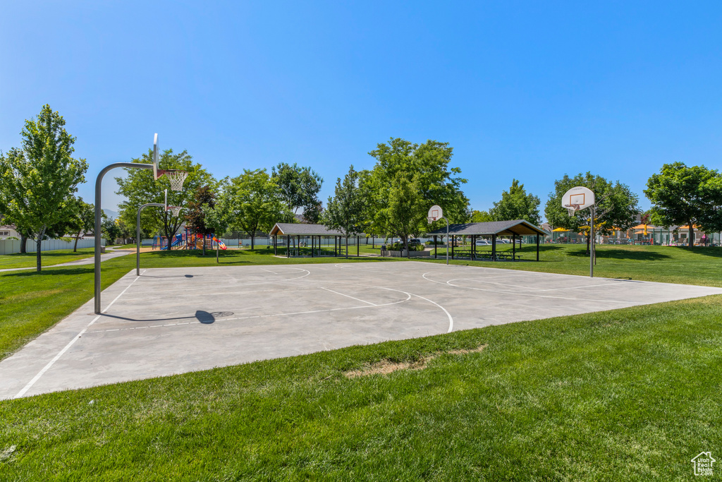 View of sport court featuring community basketball court, a lawn, and a gazebo