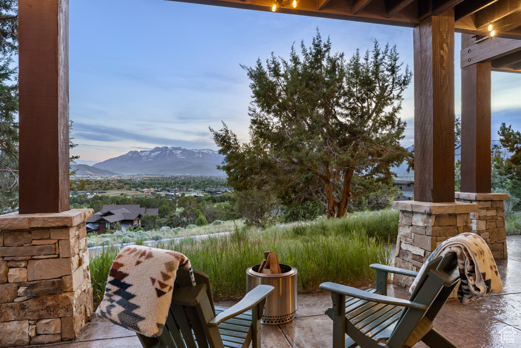 View of patio / terrace with a mountain view
