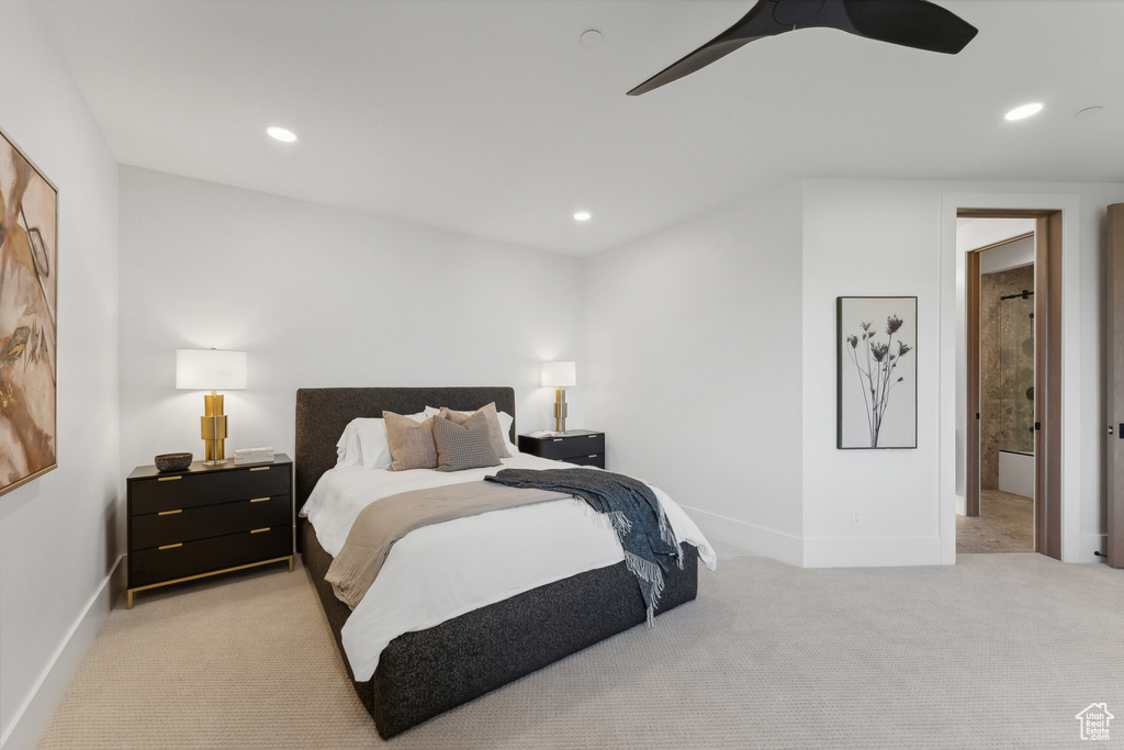 Bedroom featuring light carpet, baseboards, recessed lighting, ceiling fan, and connected bathroom