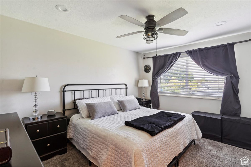Bedroom with carpet and ceiling fan
