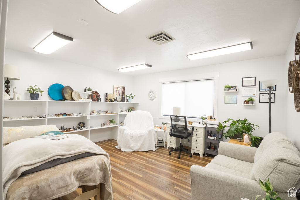 Home office featuring light wood-type flooring