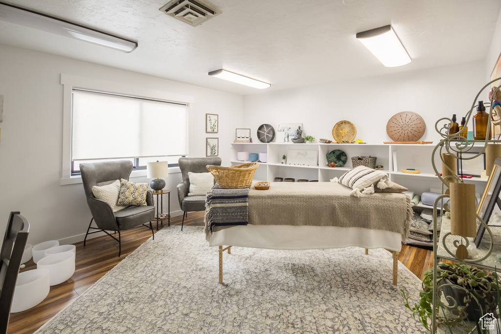 Living room featuring wood finished floors