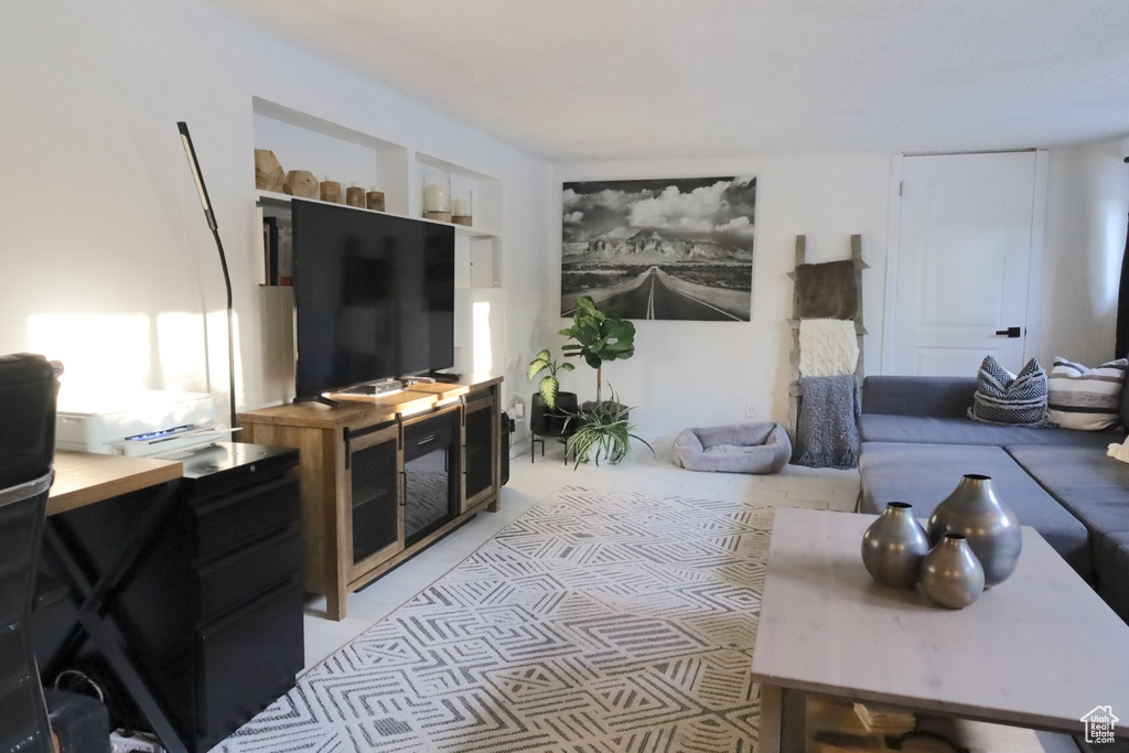 Living area featuring a desk