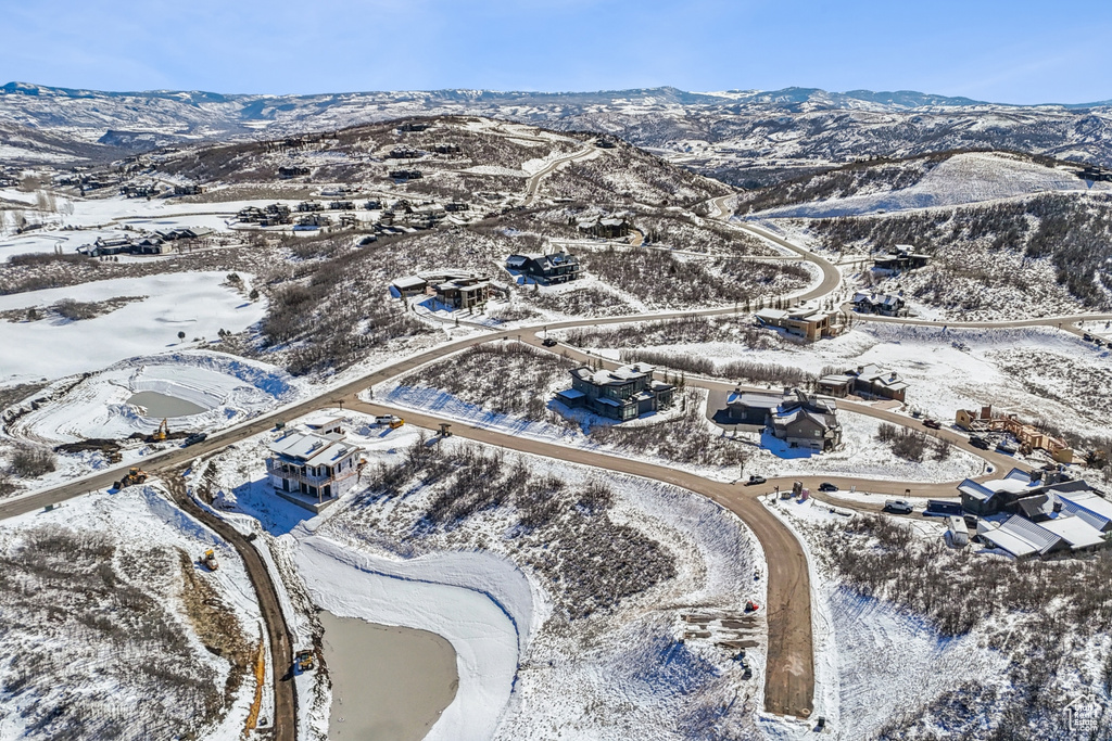 Snowy aerial view with a mountain view