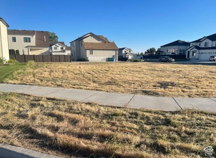 View of yard featuring a residential view