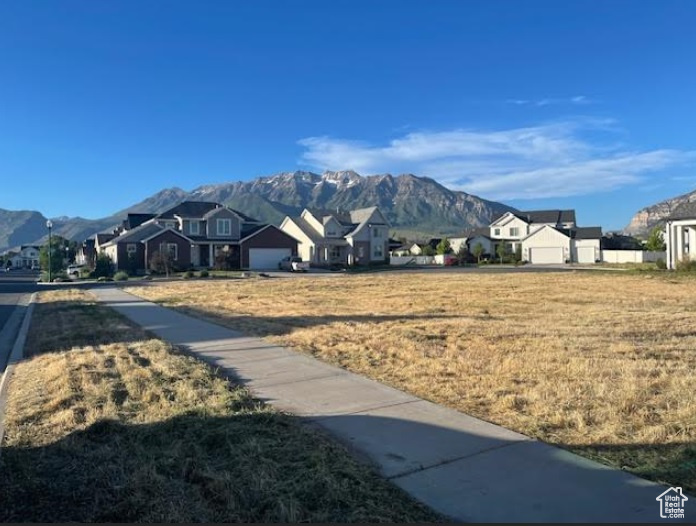 View of mountain backdrop with nearby suburban area
