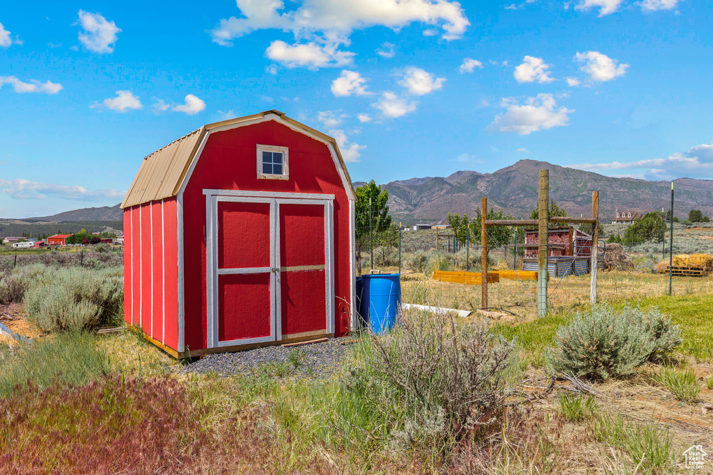 View of shed featuring a mountain view and a view of countryside
