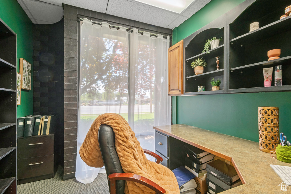 View of carpeted home office