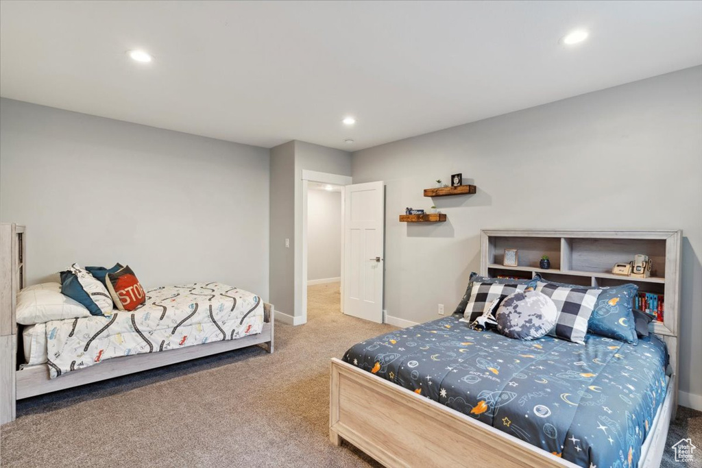 Bedroom with carpet floors, recessed lighting, and baseboards