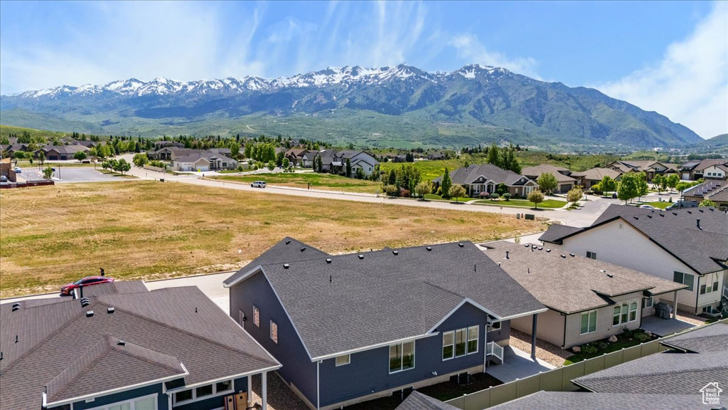 View of mountain background featuring nearby suburban area